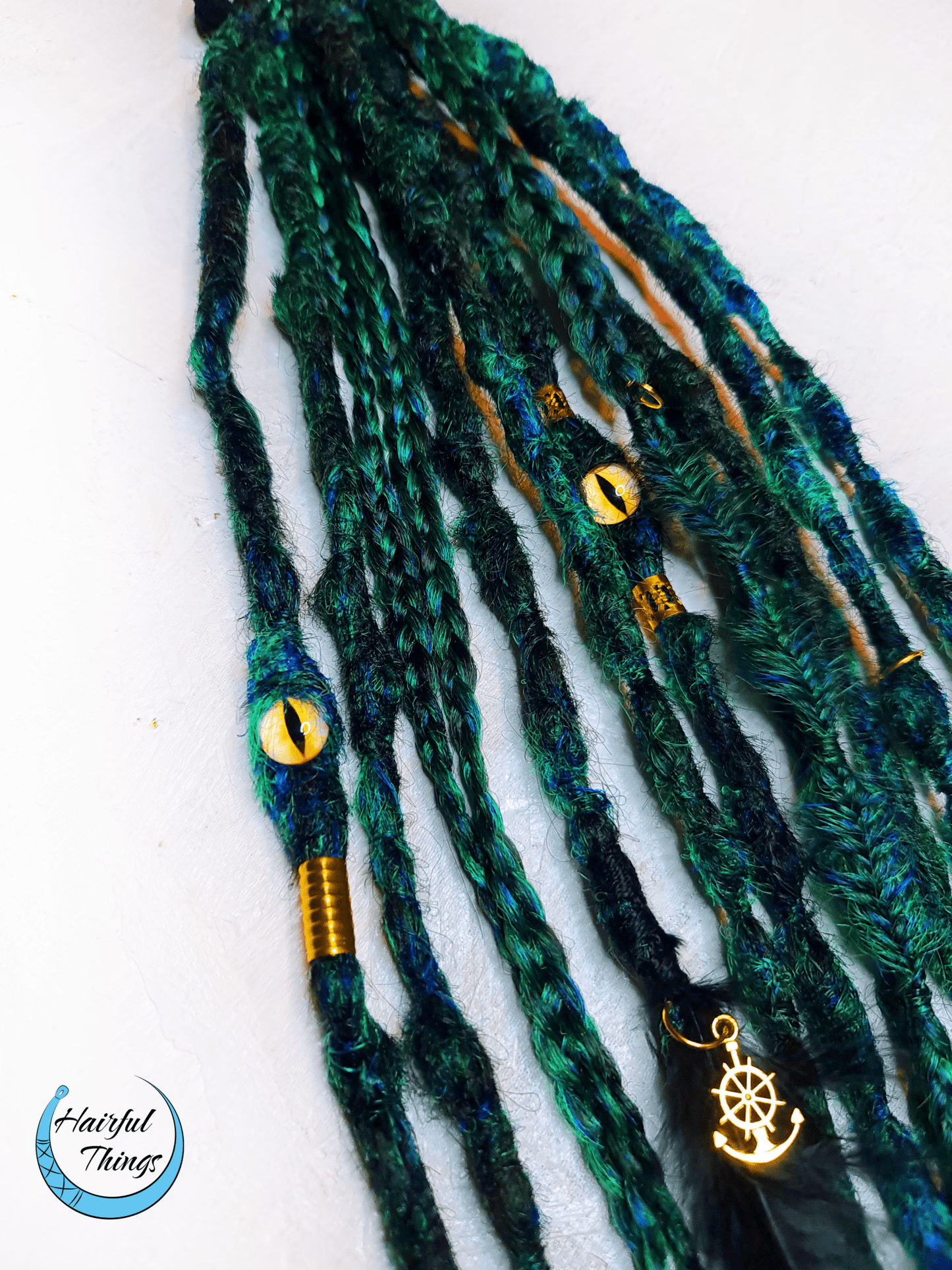 Green afro-elastic with textured dreads and box braids – Hairful